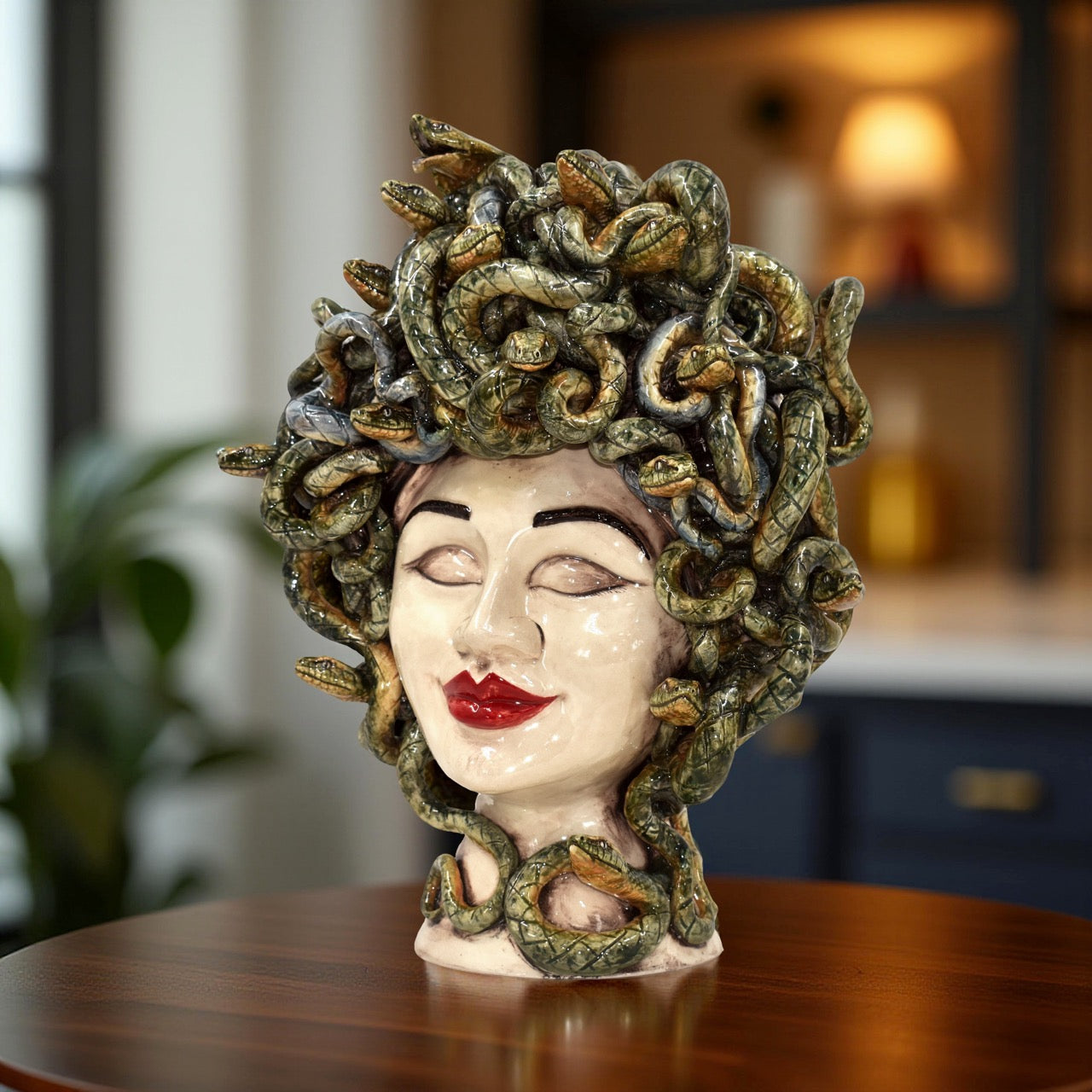 Handcrafted female ceramic head with red lips and snake hair, Medusa-style Sicilian decor