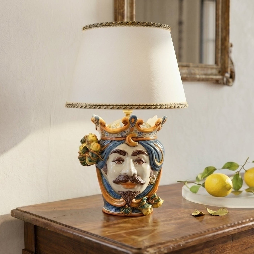 Handmade Sicilian Testa di Moro table lamp with crown, mustache, and citrus details, blending tradition and modern design.