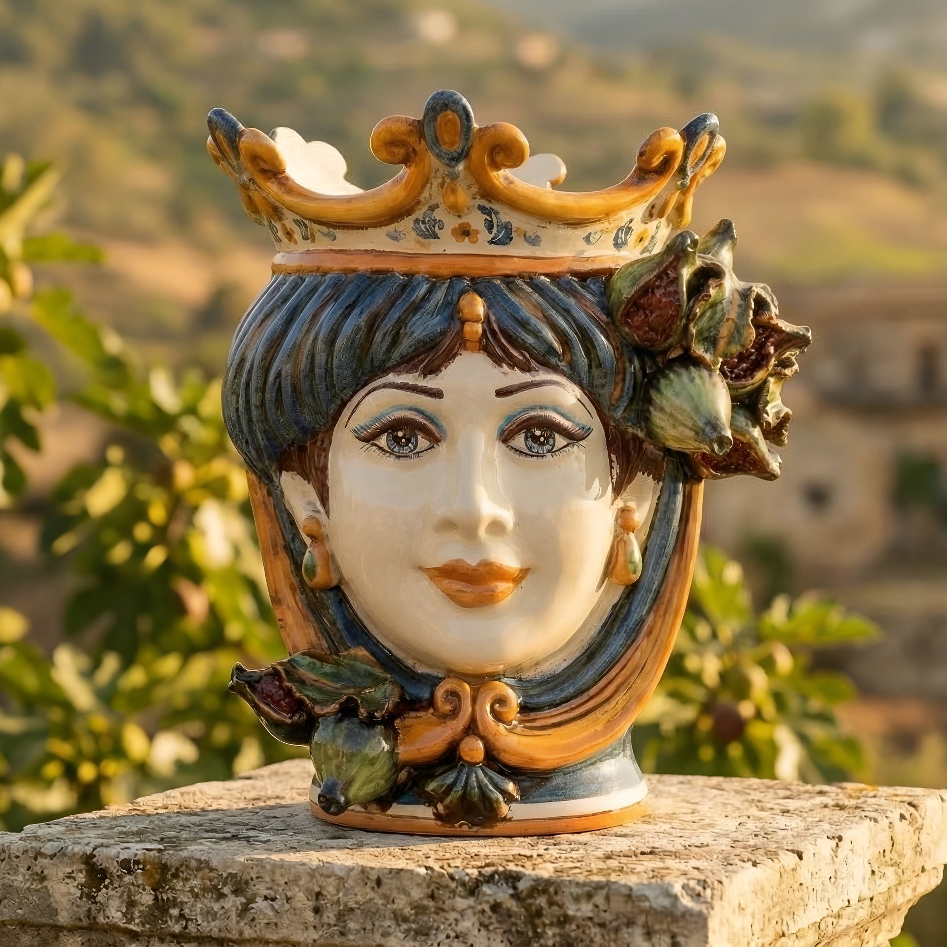 Handmade Testa di Moro ceramic vase with crown, figs, and blue hair, perfect for home decor