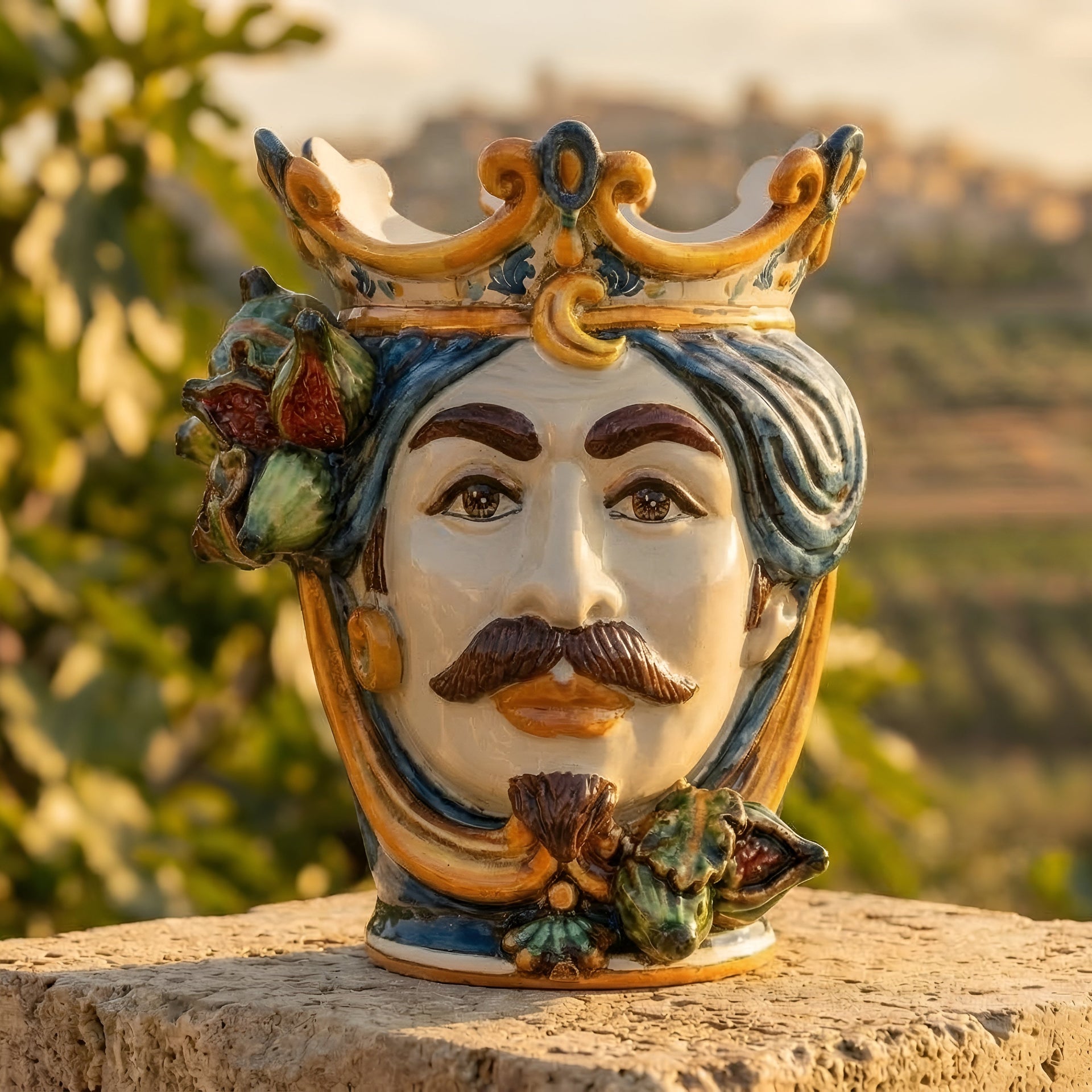 Handmade Teste di Moro ceramic vase with crown, mustache, and figs, blending tradition and modern design.
