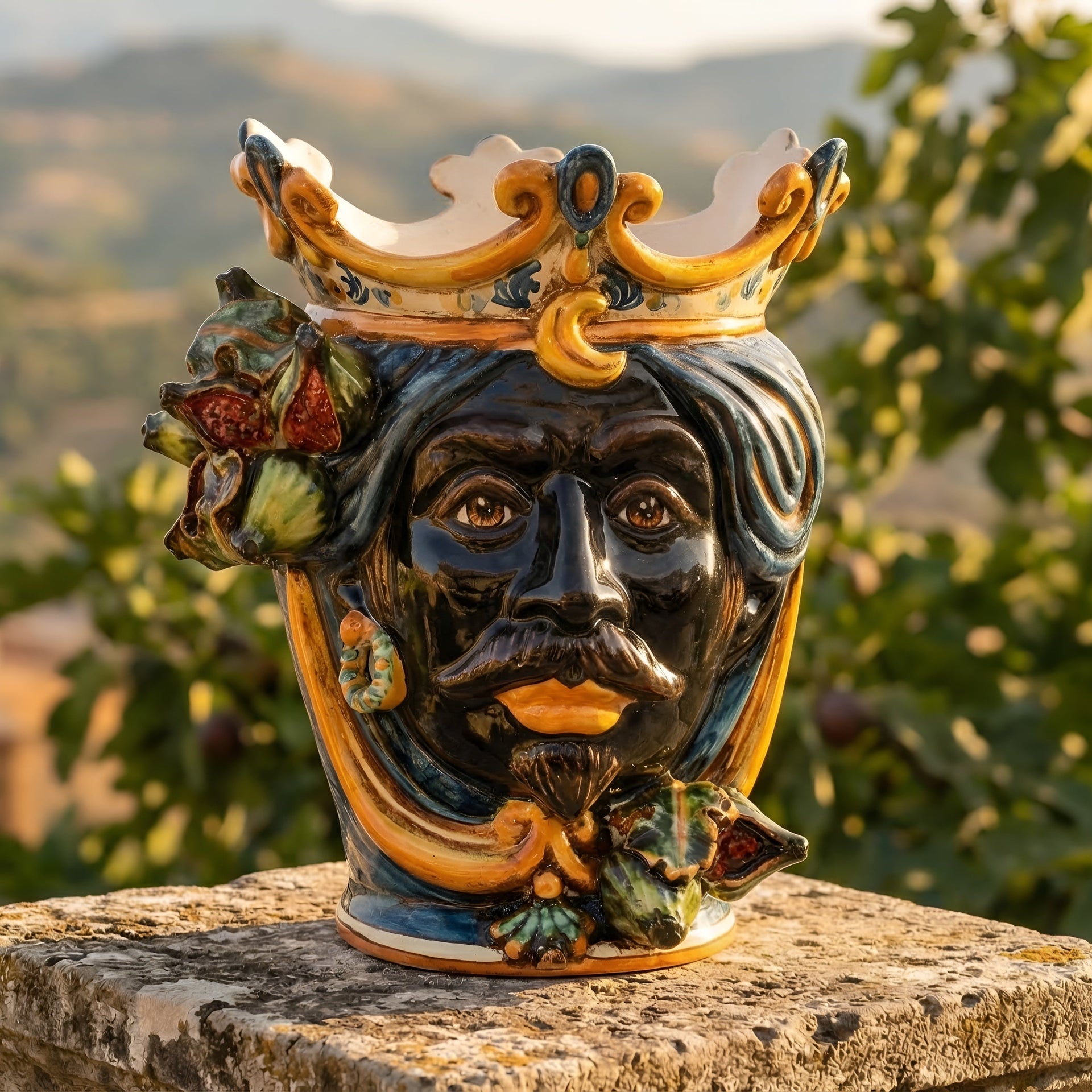 Handcrafted Teste di Moro ceramic vase with crown, figs, and vibrant glazes, blending tradition and modern design.