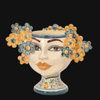 Handmade Teste di Moro vase with floral crown, ceramic face design, traditional Sicilian art for home decor