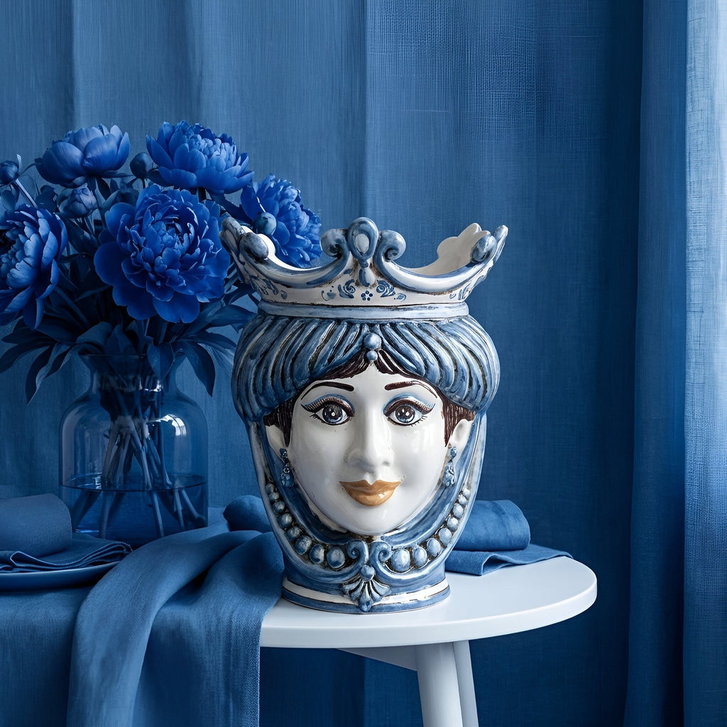 Handcrafted Teste di Moro vase with crown, blue floral decor, modern traditional design