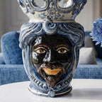 Handmade Teste di Moro ceramic vase with blue and white crown, featuring expressive face and traditional Sicilian design.