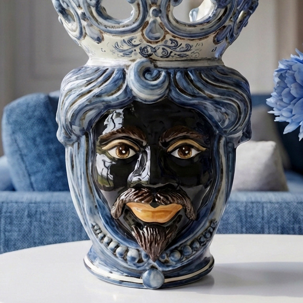 Handmade Teste di Moro ceramic vase with blue and white crown, featuring expressive face and traditional Sicilian design.