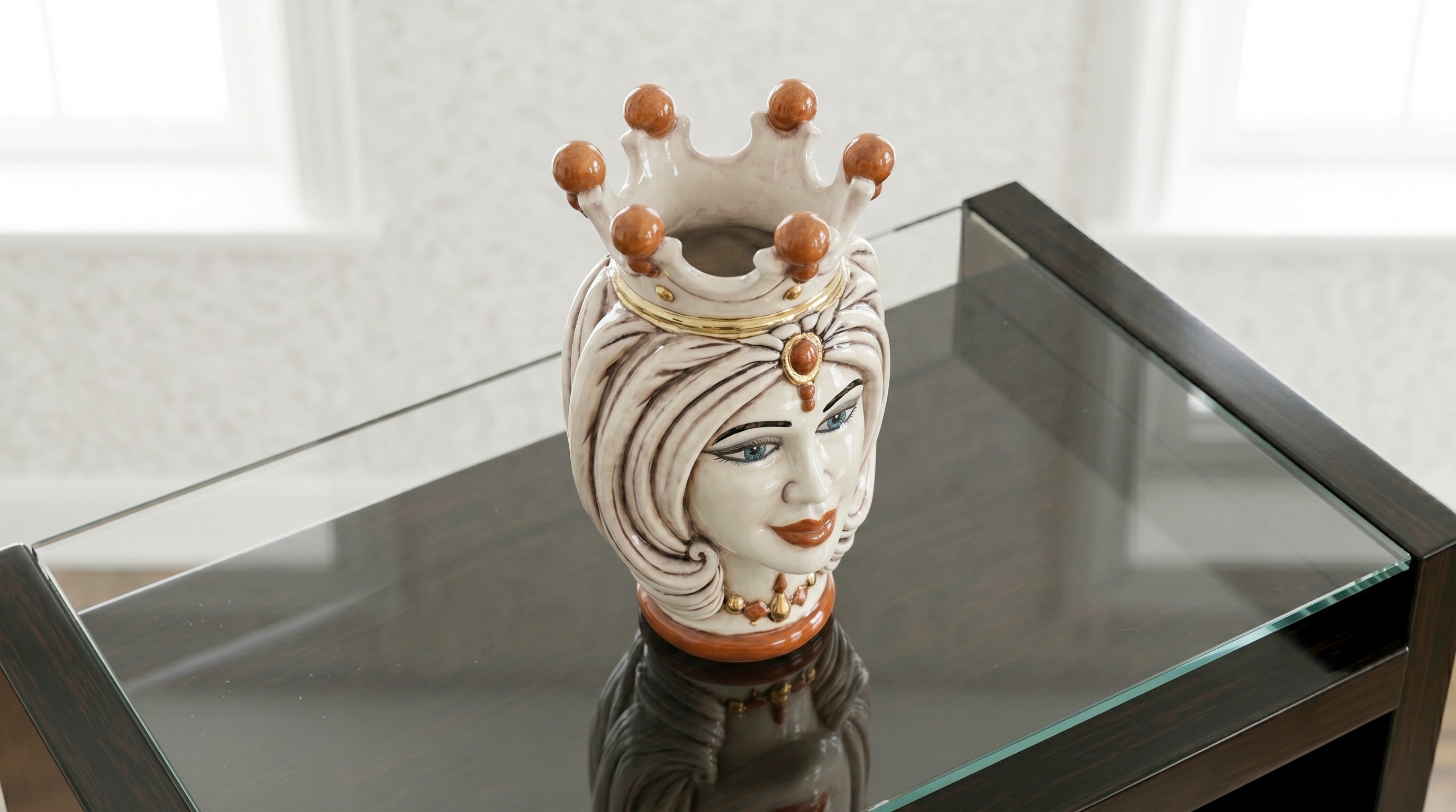 Handcrafted Teste di Moro ceramic vase with crown, showcasing traditional Sicilian art for modern home decor.