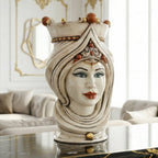 Handcrafted Teste di Moro ceramic vase with ornate crown, blue eyes, and red lips, perfect for luxury home decor.