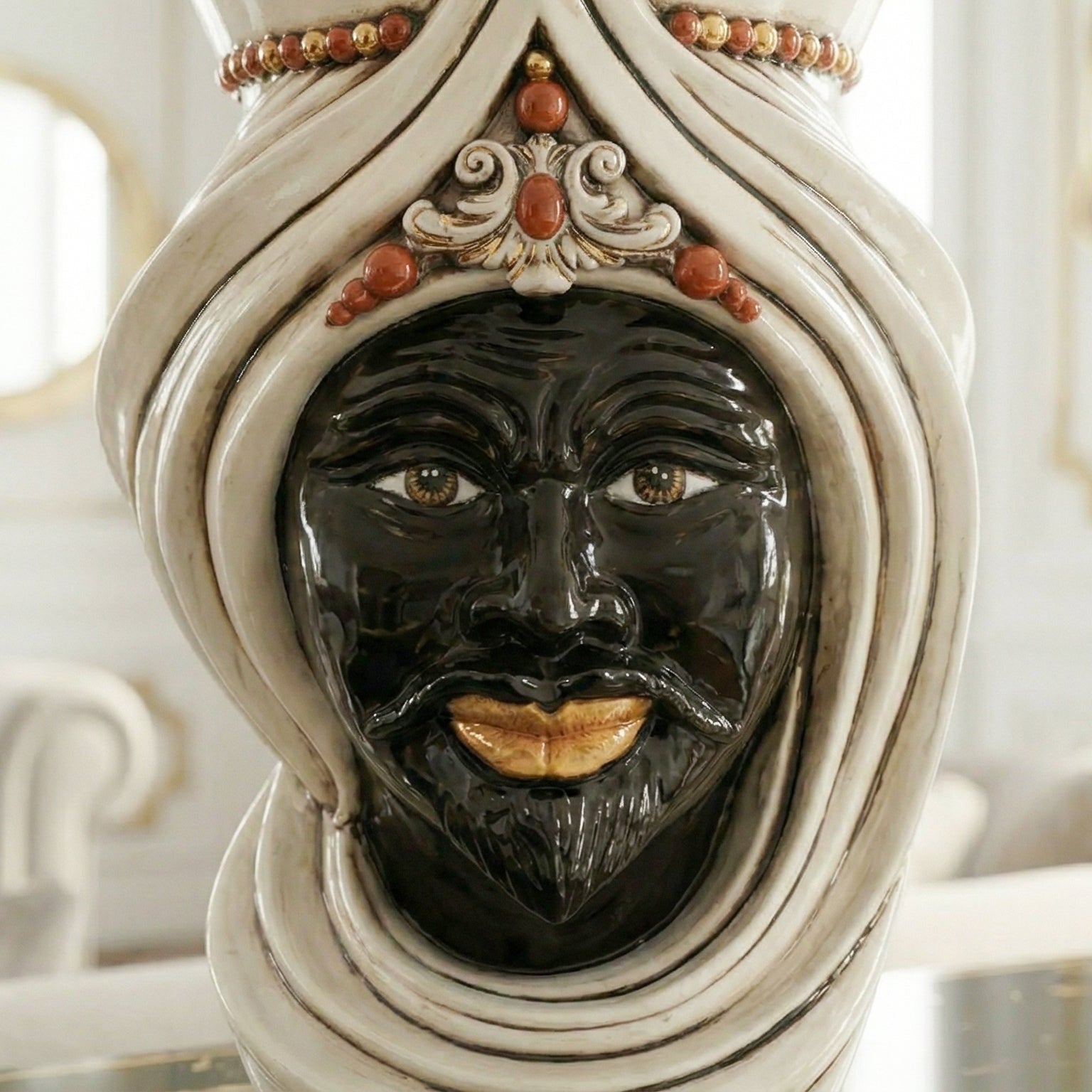 Handmade Teste di Moro ceramic vase with black face, white turban, and gold accents, blending tradition and modern design.