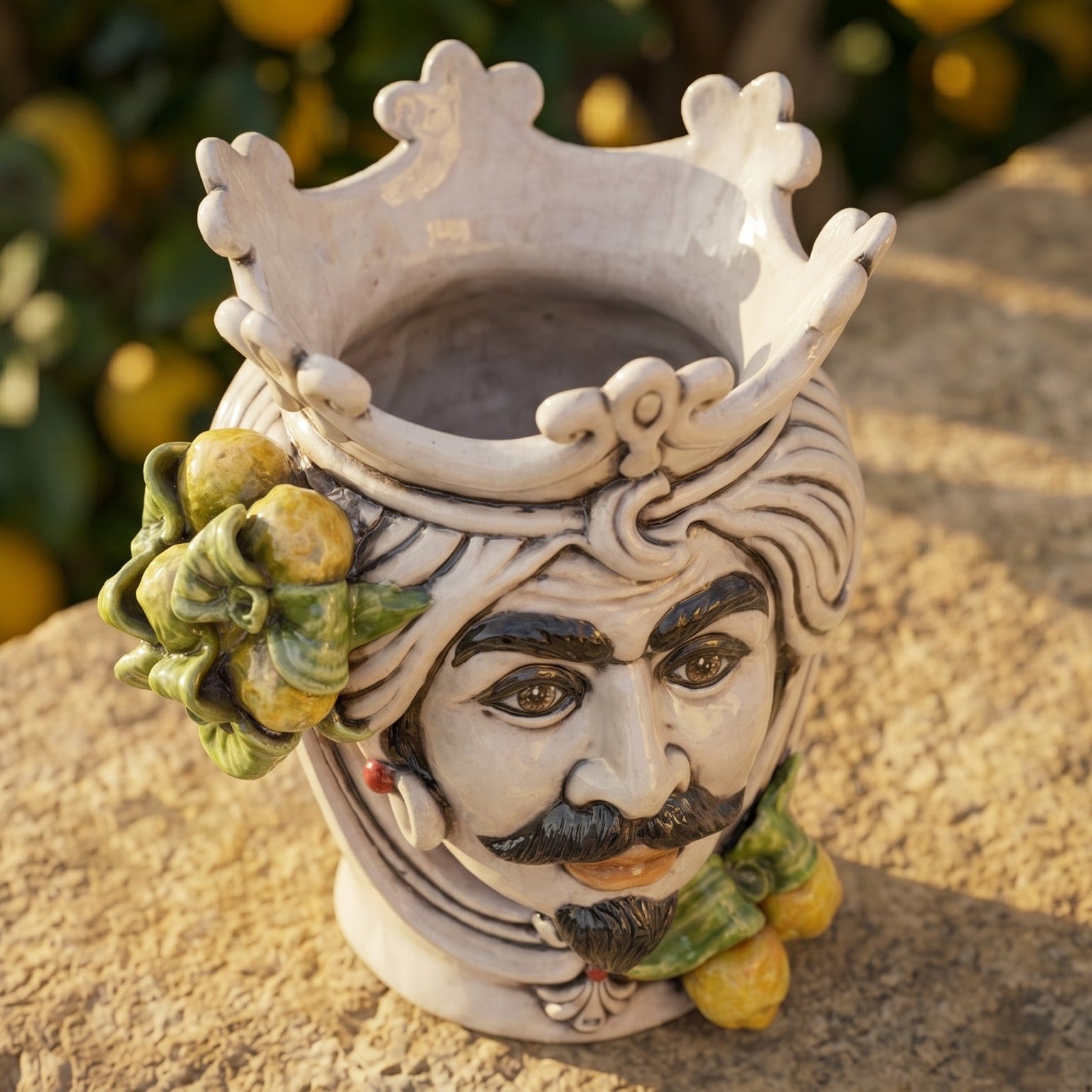 Handcrafted Teste di Moro ceramic vase with crown, citrus details, and expressive face, blending tradition and modern design.