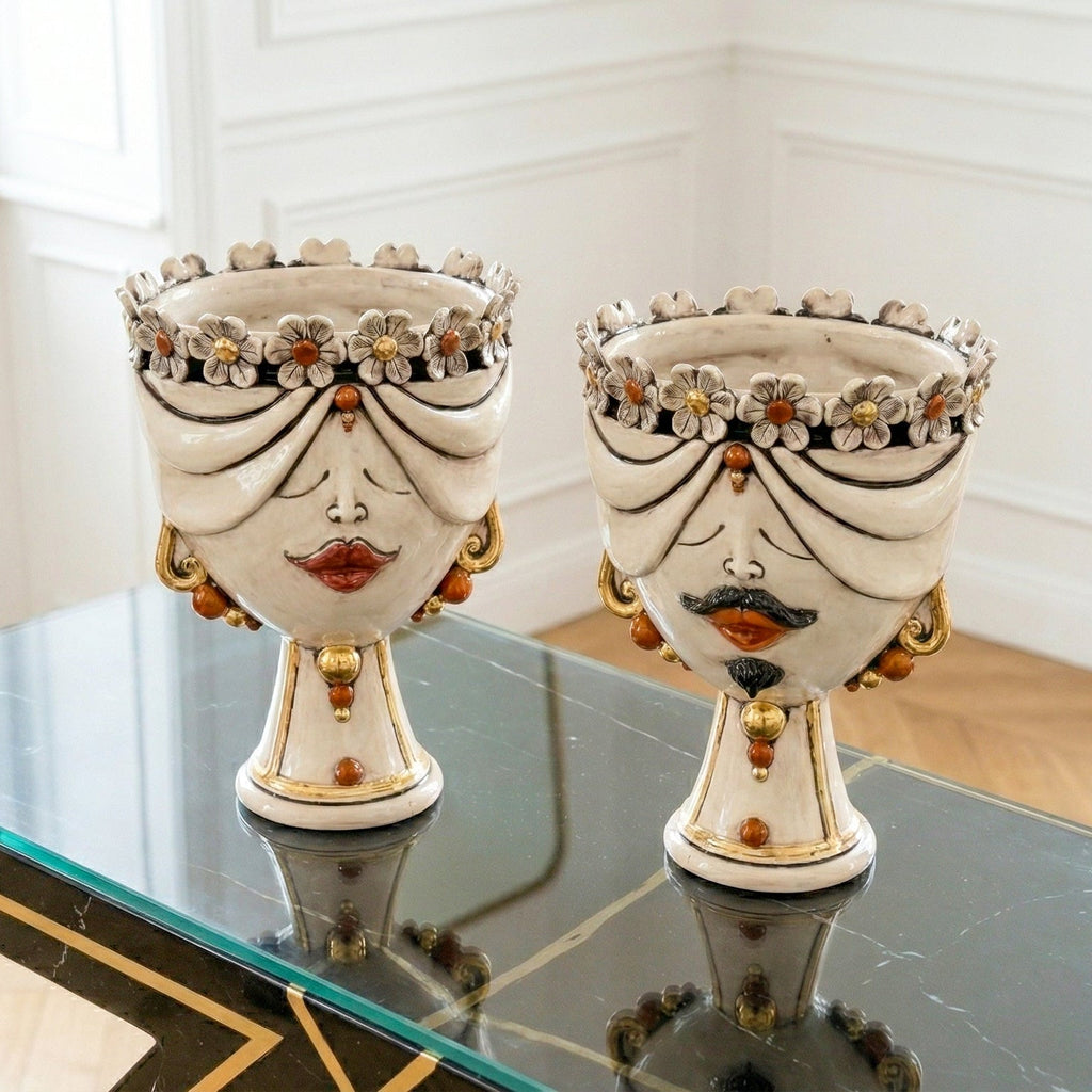 Handcrafted Teste di Moro ceramic vases with floral crowns and gold accents, perfect for modern home decor