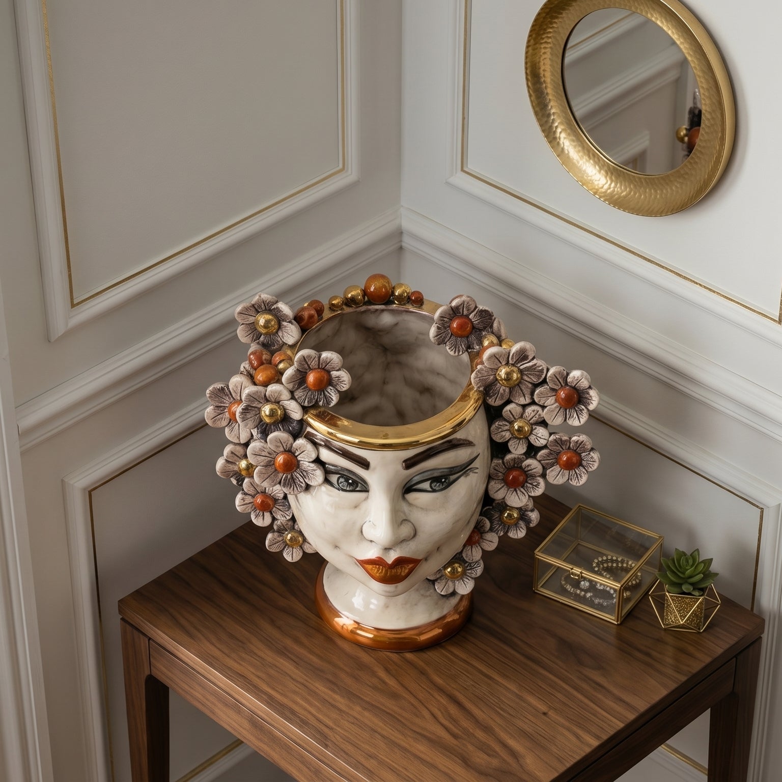 Handcrafted Teste di Moro vase with floral crown, marble finish, and gold accents on wooden table