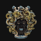 Handcrafted Teste di Moro ceramic sculpture with serpent hair, blending tradition and modern design.