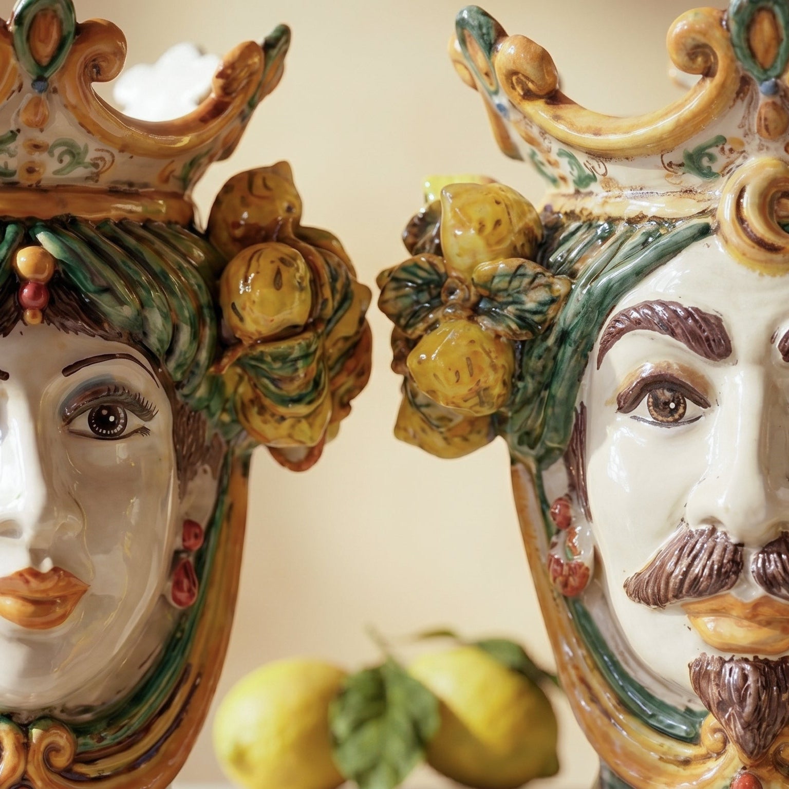 Handcrafted Teste di Moro ceramic faces with lemon motifs, blending tradition and modern design
