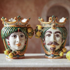 Handmade Teste di Moro ceramic vases with crowned faces, lemon accents, and vibrant Sicilian design for home decor