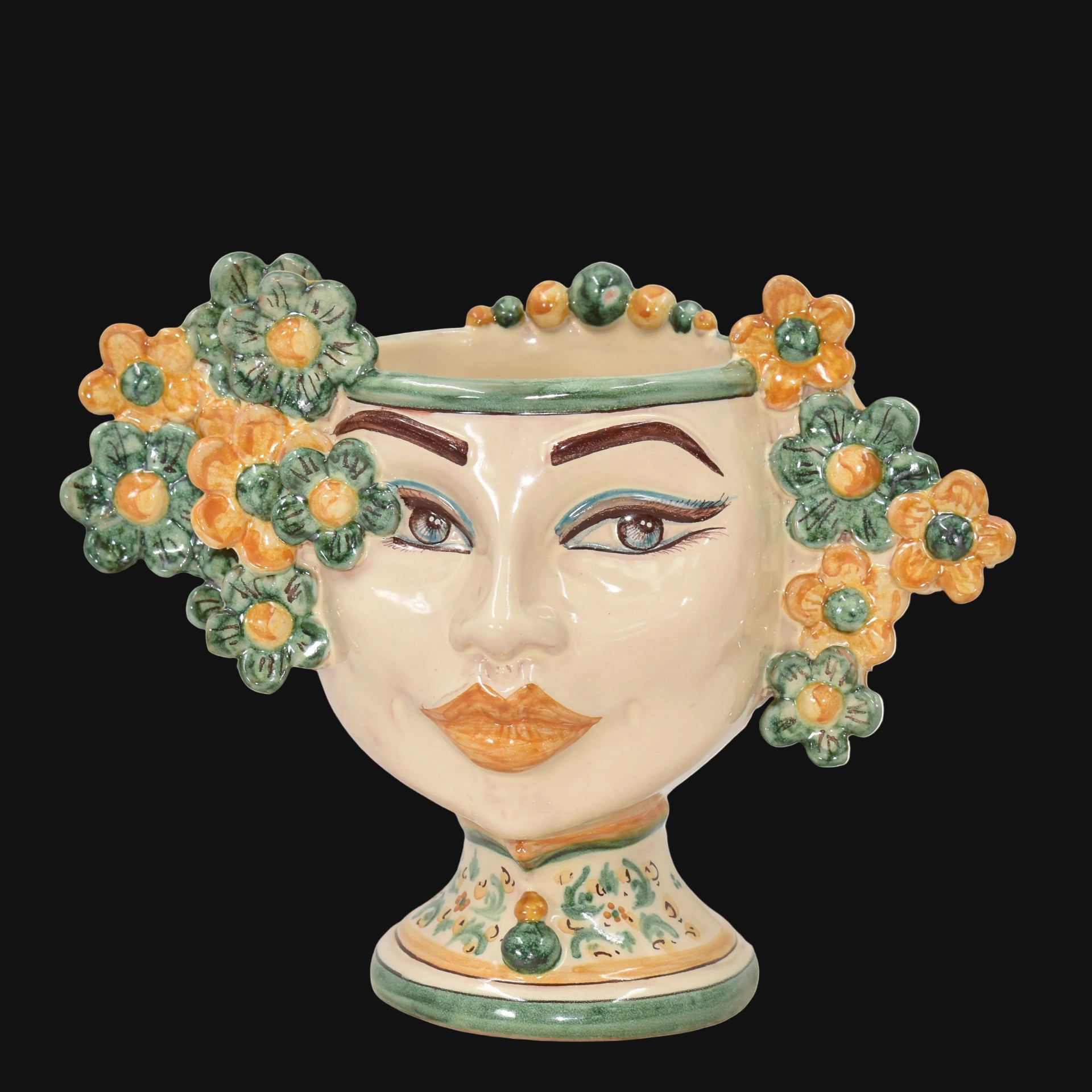 Handmade ceramic Testa di Moro vase with floral crown, vibrant green and orange glaze, traditional Sicilian design