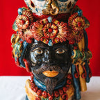 Handcrafted Teste di Moro ceramic vase with vibrant floral crown and bold colors, traditional Sicilian design