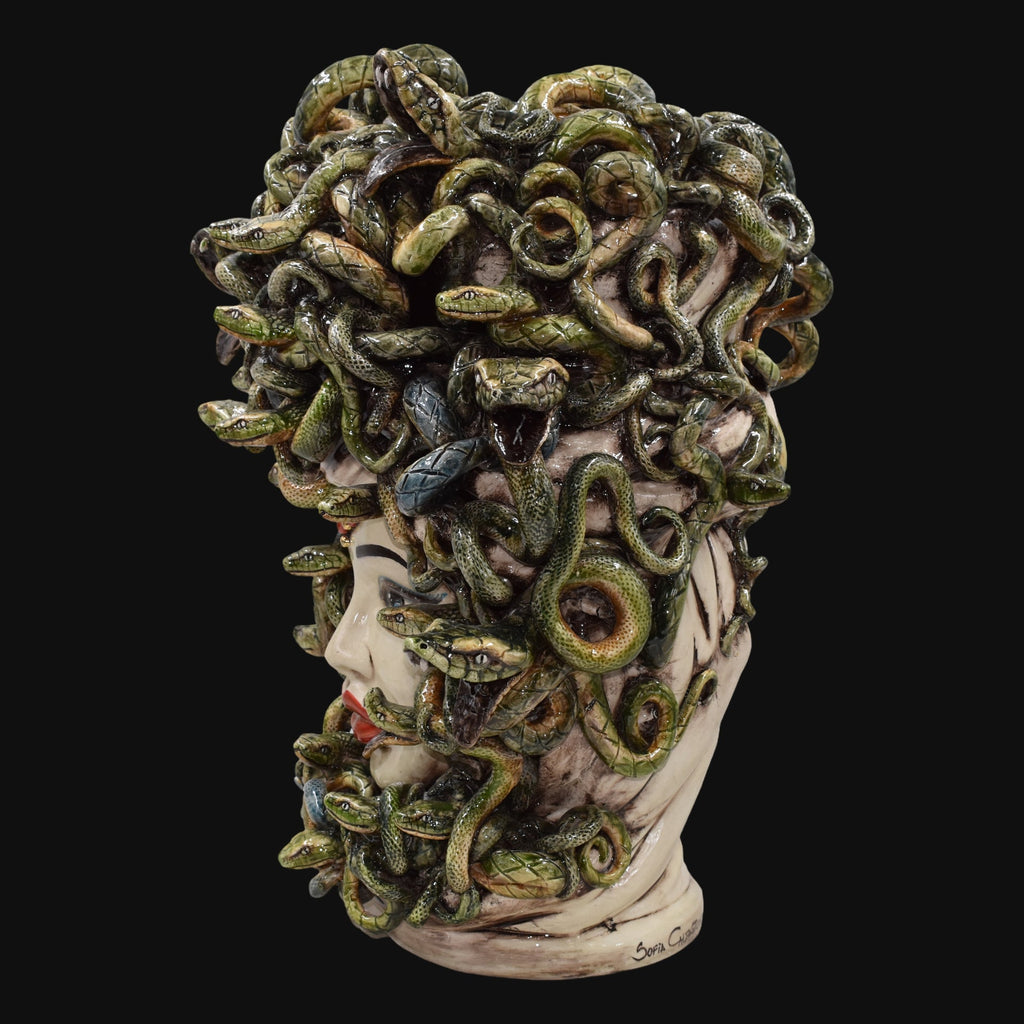 Handcrafted Medusa head sculpture with green snakes, ceramic art for modern home decor