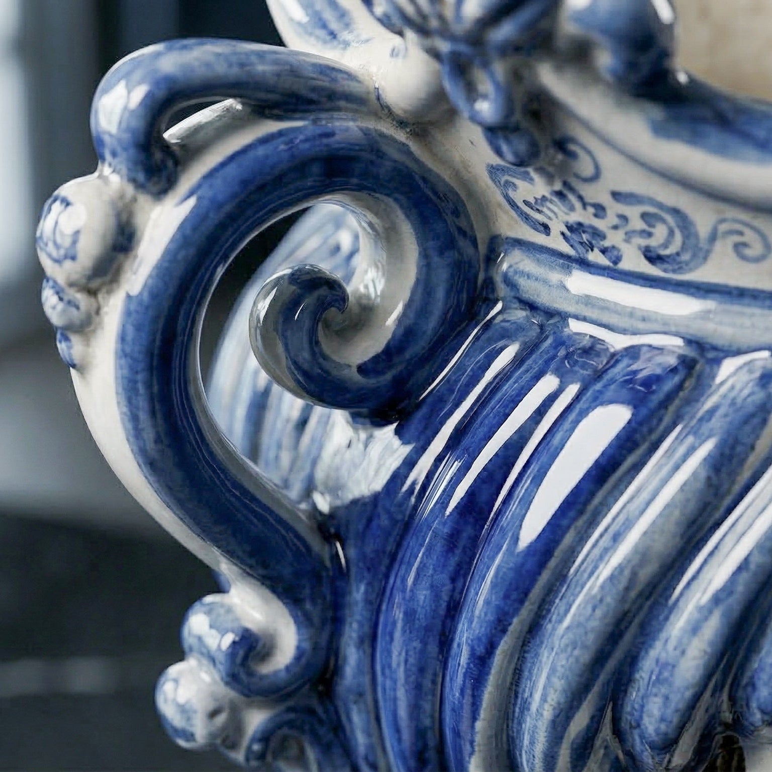 Blue and white ceramic Teste di Moro with intricate scrollwork and hand-painted details