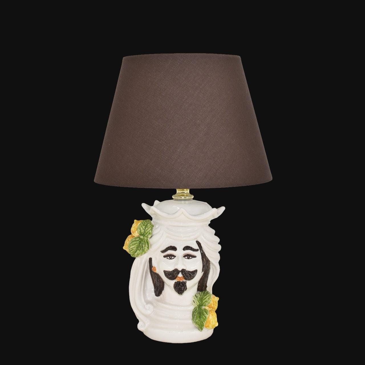Lampada in ceramica di Caltagirone fatta a mano con testa di moro e decori floreali
