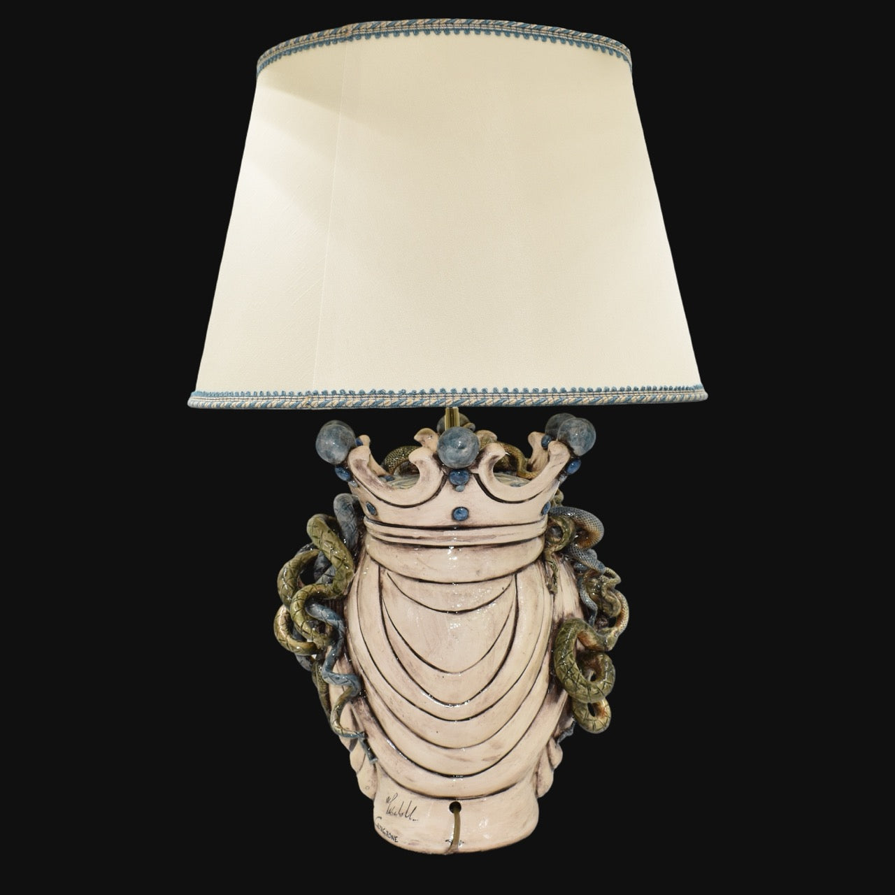 Handcrafted Teste di Moro table lamp with crown and snakes, cream shade, artisan ceramic design