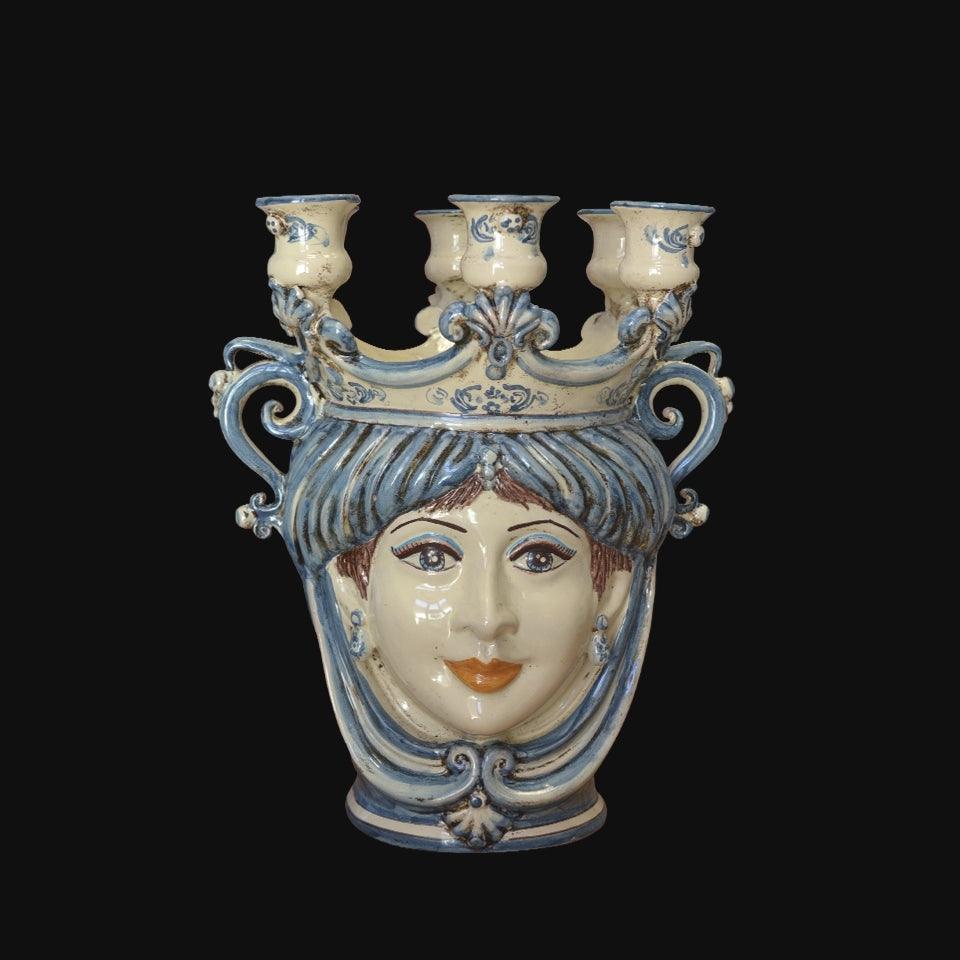 Handmade ceramic Teste di Moro candle holder with blue and white design, featuring a woman’s face and ornate crown.