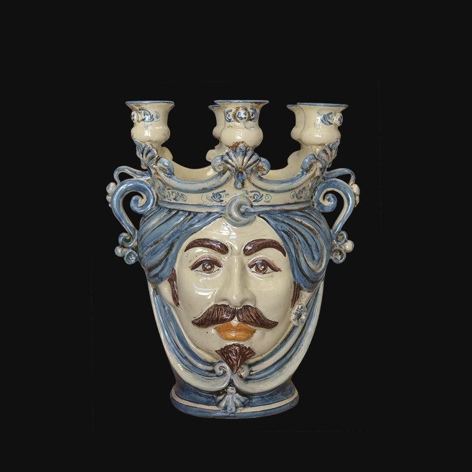 Handmade Teste di Moro ceramic vase with blue turban, mustache, and three candle holders, blending tradition and modern design.