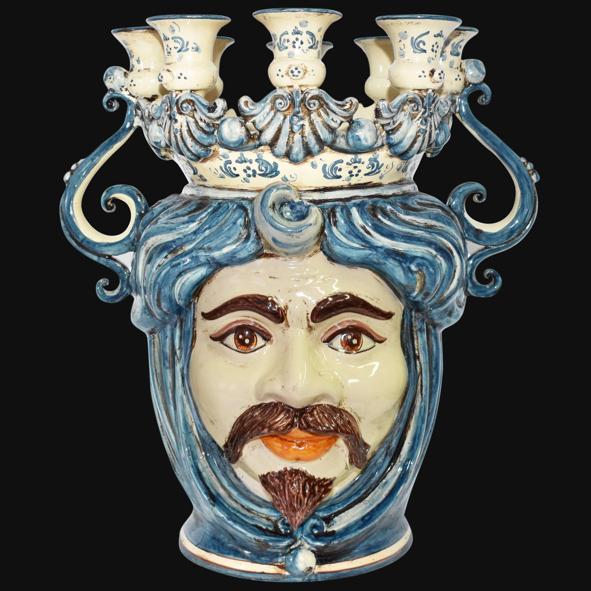 Handmade Teste di Moro ceramic candelabra with blue swirls, mustache, and crown, blending tradition and modern design.