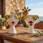 Handcrafted Teste di Moro ceramic vases with lemon-adorned faces, perfect for Mediterranean home decor