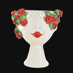 Handmade Teste di Moro vase with red roses and green leaves, white ceramic face design