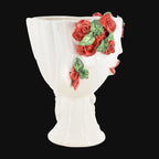 White ceramic Teste di Moro vase with red rose and green leaf detailing, handmade decorative art piece