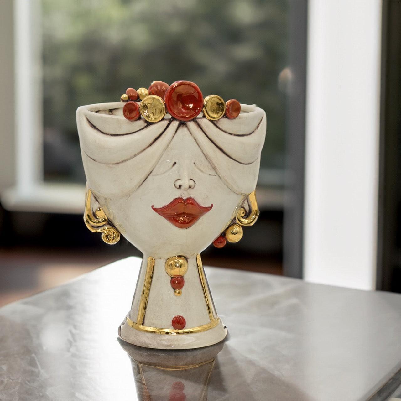 Handmade Teste di Moro ceramic vase with red lips, gold accents, and decorative beads, perfect for modern home decor.