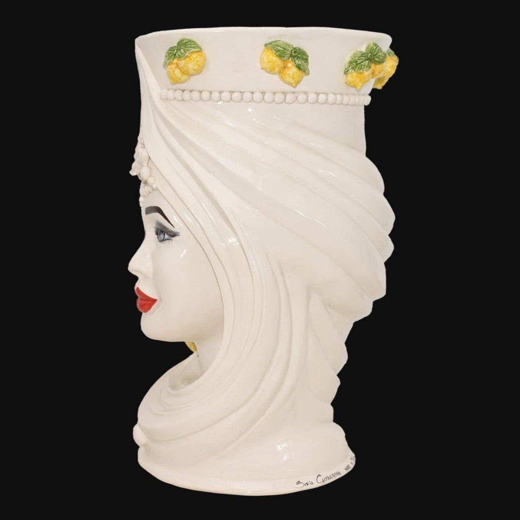 Handcrafted Teste di Moro vase with lemon accents, blending tradition and modern design for elegant decor.