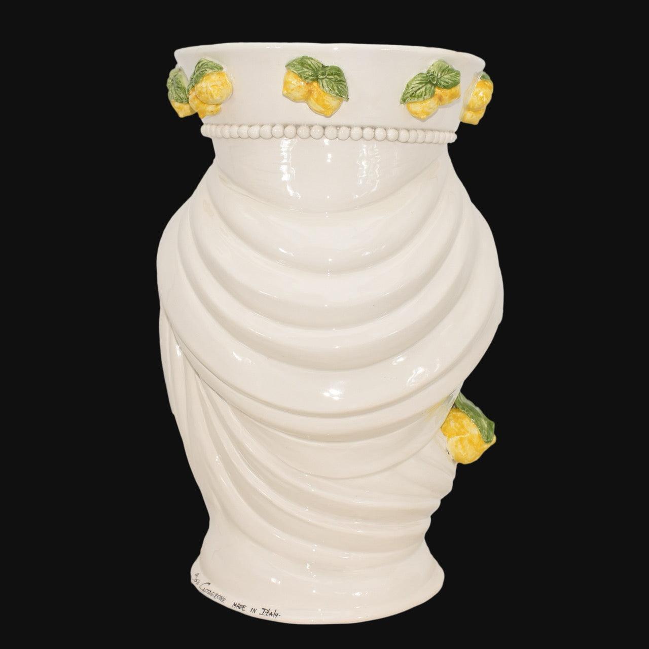 Handcrafted white ceramic vase with lemon motifs, drapery design, and 'Made in Italy' mark, perfect for modern decor.