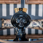 Handcrafted black Teste di Moro vase with gold rim, blending Sicilian tradition and modern design for home decor.