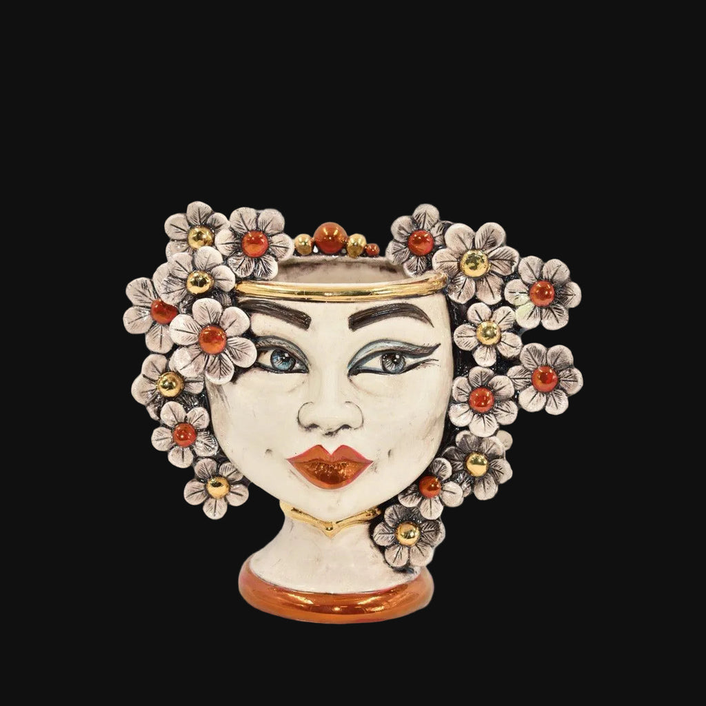Handmade Teste di Moro vase with floral crown, blue eyes, and gold accents, blending tradition and modern design.