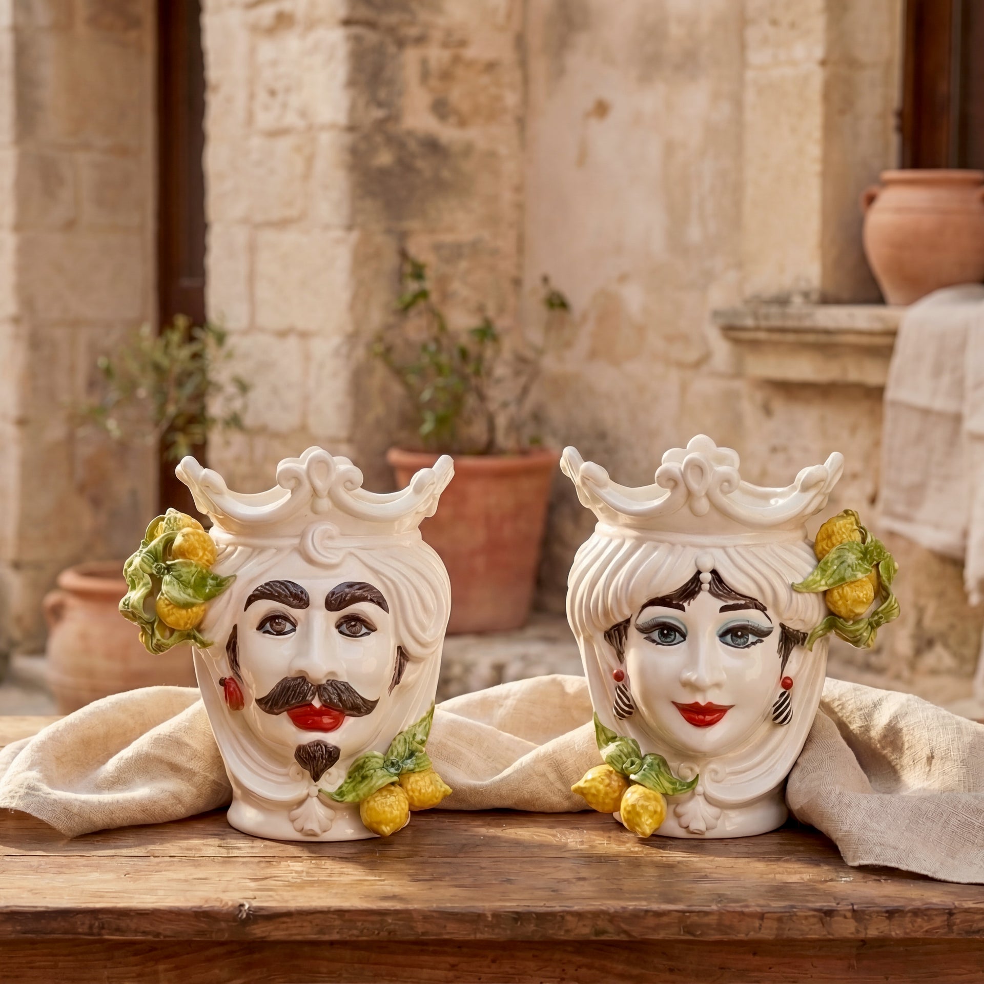 Handmade Teste di Moro ceramic faces with crowns and lemons, traditional Sicilian decor for home styling