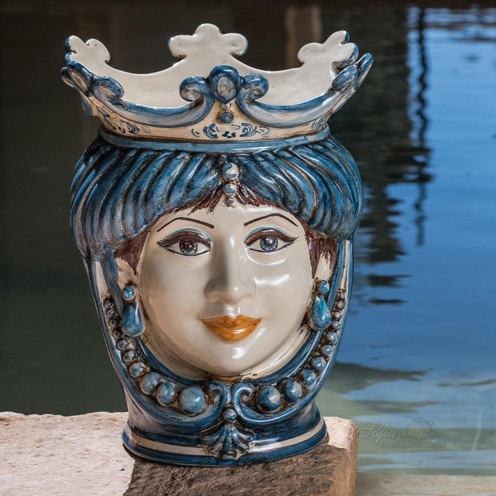 Handmade ceramic Testa di Moro with blue crown and ornate details, traditional Sicilian decor