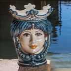 Handmade ceramic Testa di Moro with blue crown and ornate details, traditional Sicilian decor