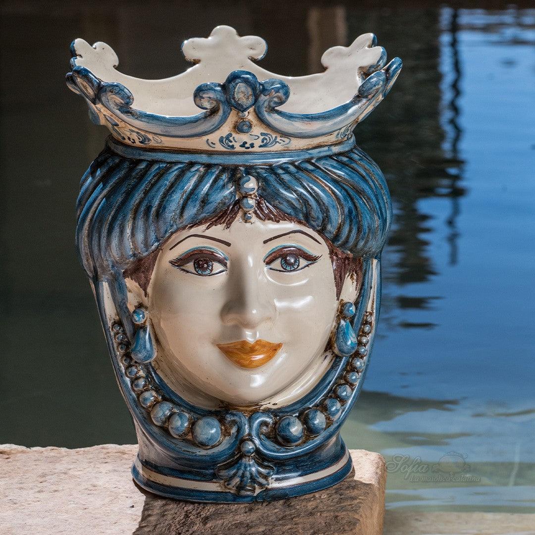 Handmade ceramic Testa di Moro with blue crown and ornate details, traditional Sicilian decor