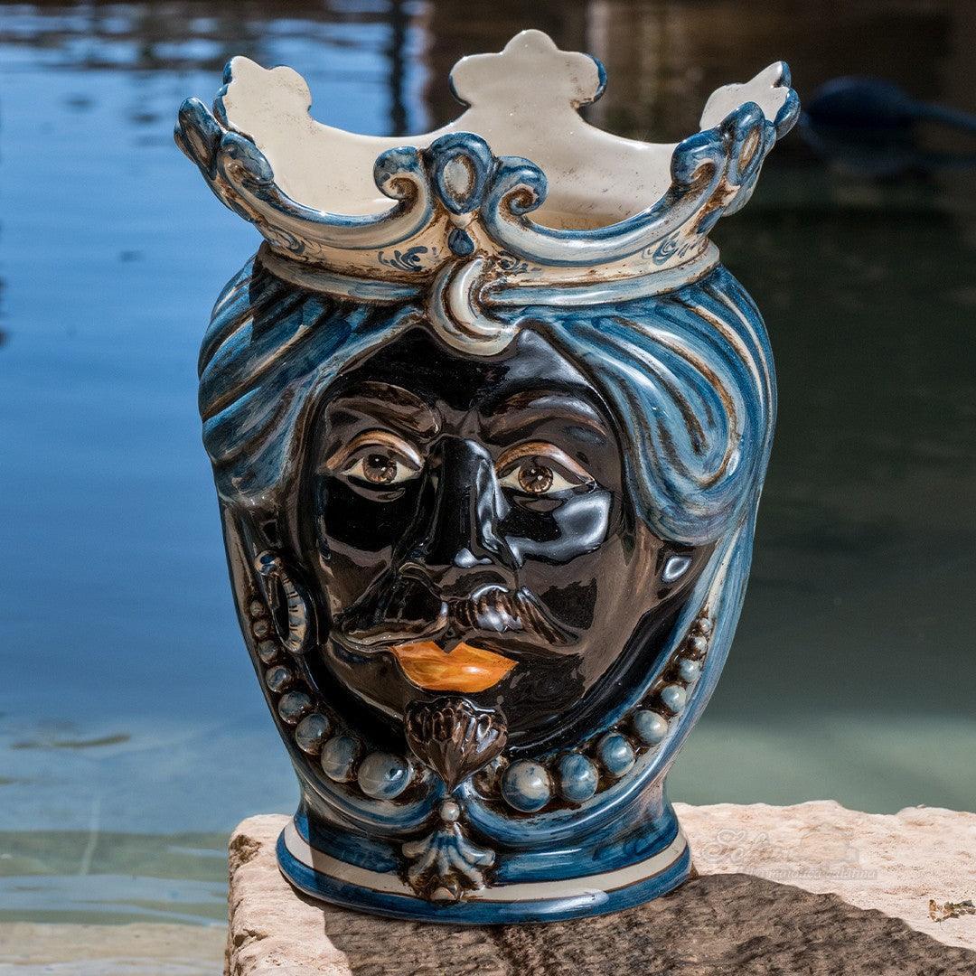 Handcrafted Teste di Moro ceramic vase with blue swirls, crown, and expressive face, perfect for decorative home accents.