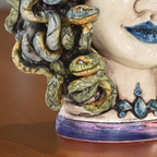 Handcrafted Teste di Moro ceramic with detailed snakes and blue lips, blending tradition and modern design.