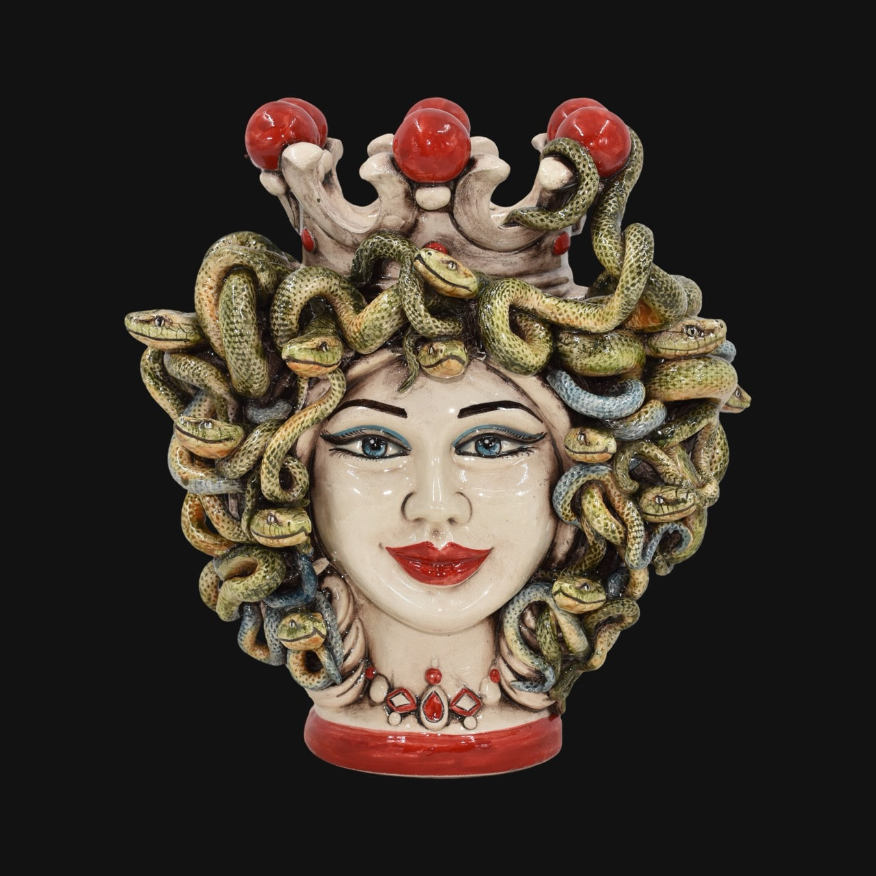 Handcrafted Teste di Moro ceramic with snake hair, red accents, and crown, blending tradition and modern design