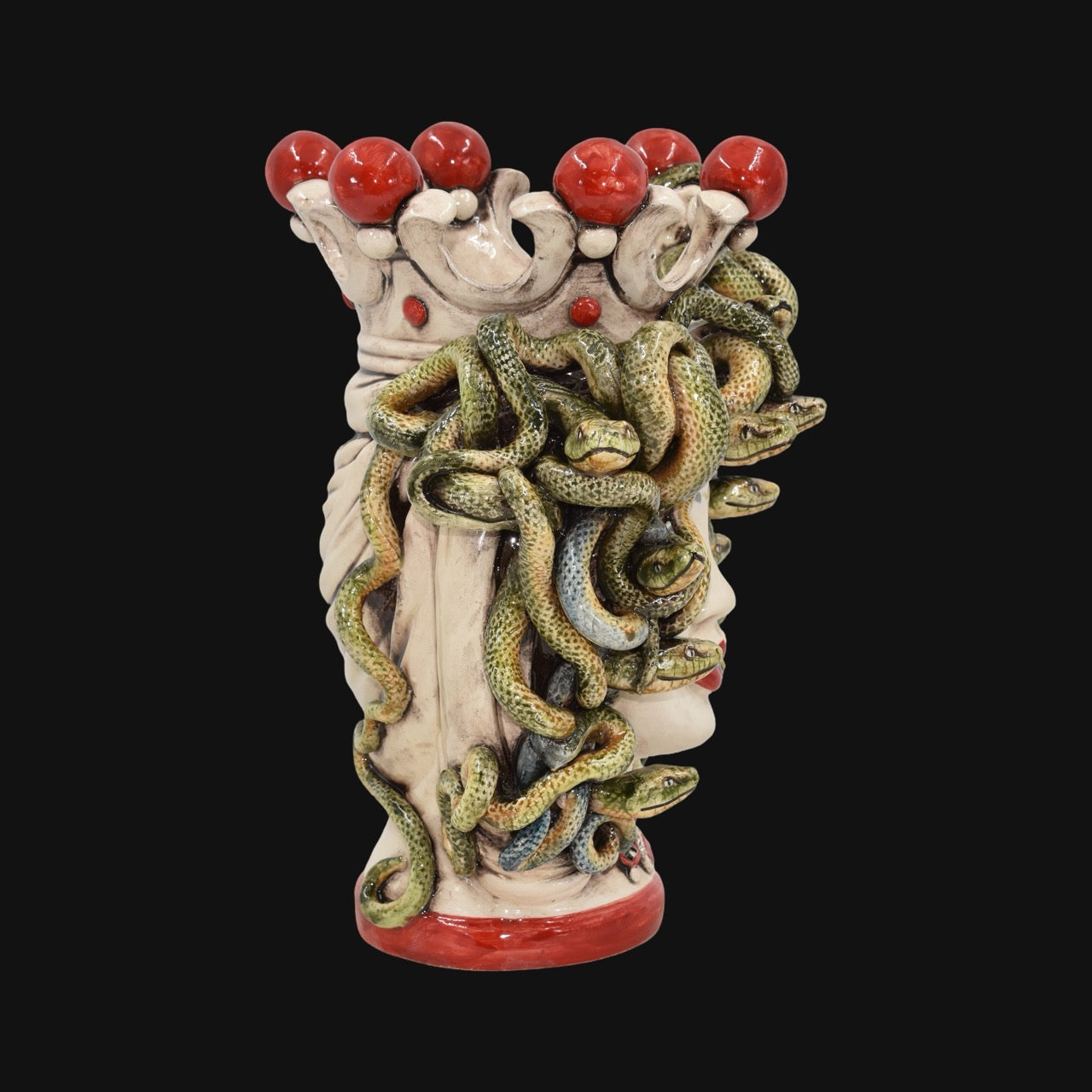 Handcrafted Teste di Moro vase with green snakes and red accents, blending tradition and modern design