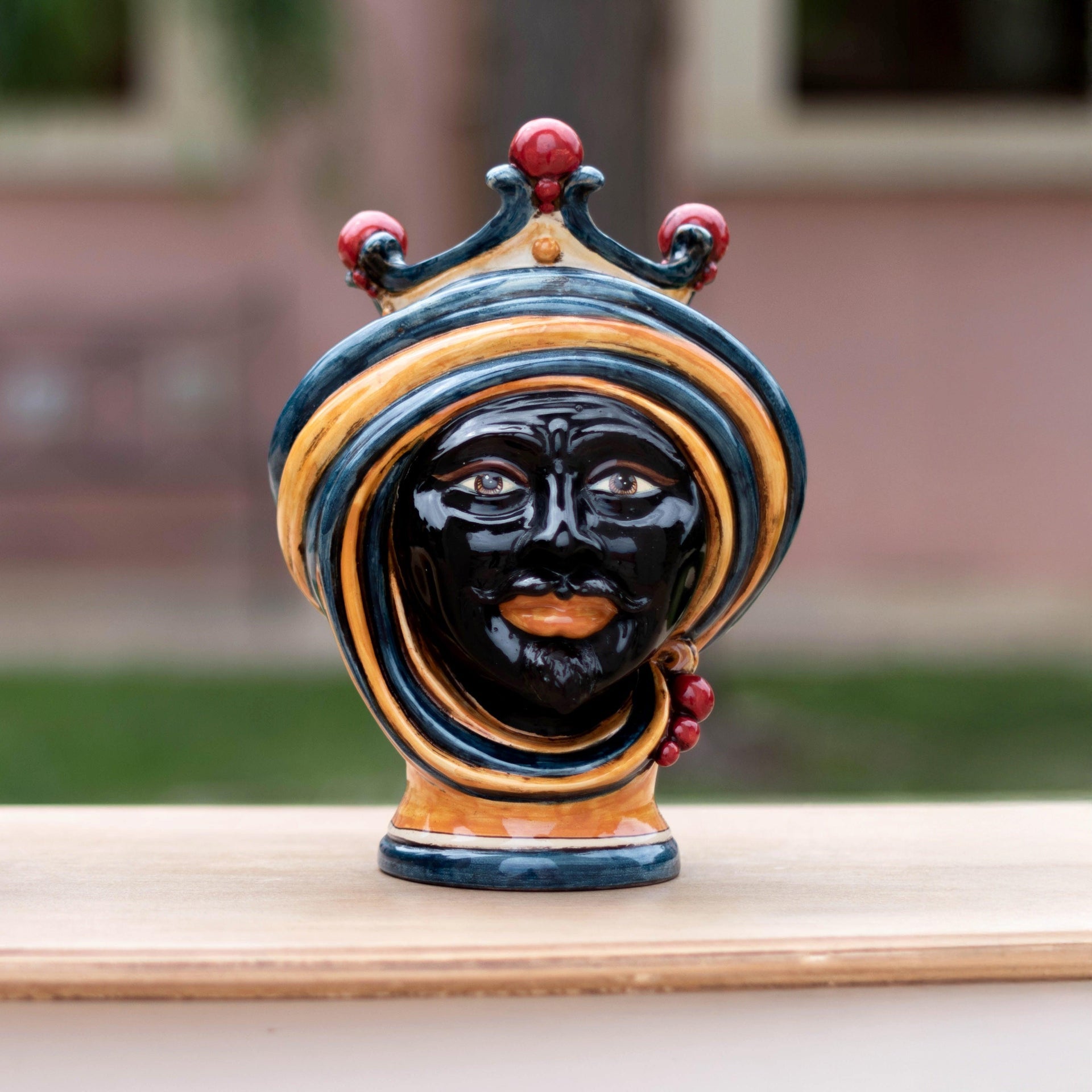 Handcrafted Caltagirone ceramic Testa di Moro male head in blue and orange with crown