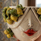 Handcrafted Teste di Moro ceramic vase with vibrant lemons and bold red lips, blending tradition and modern design.