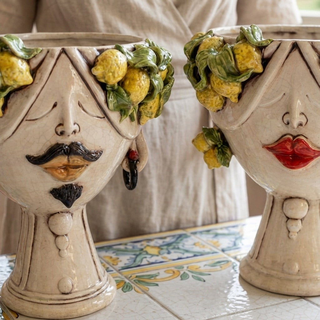 Handmade Teste di Moro ceramic vases with lemon motifs, mustache and lips details, traditional Sicilian design