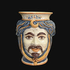 Handcrafted Teste di Moro vase with blue hair, mustache, and ornate details, blending tradition and modern design.