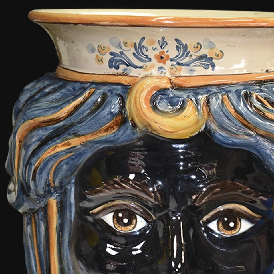 Handmade Teste di Moro ceramic vase with blue hair, floral details, and expressive eyes, blending tradition and modern design.