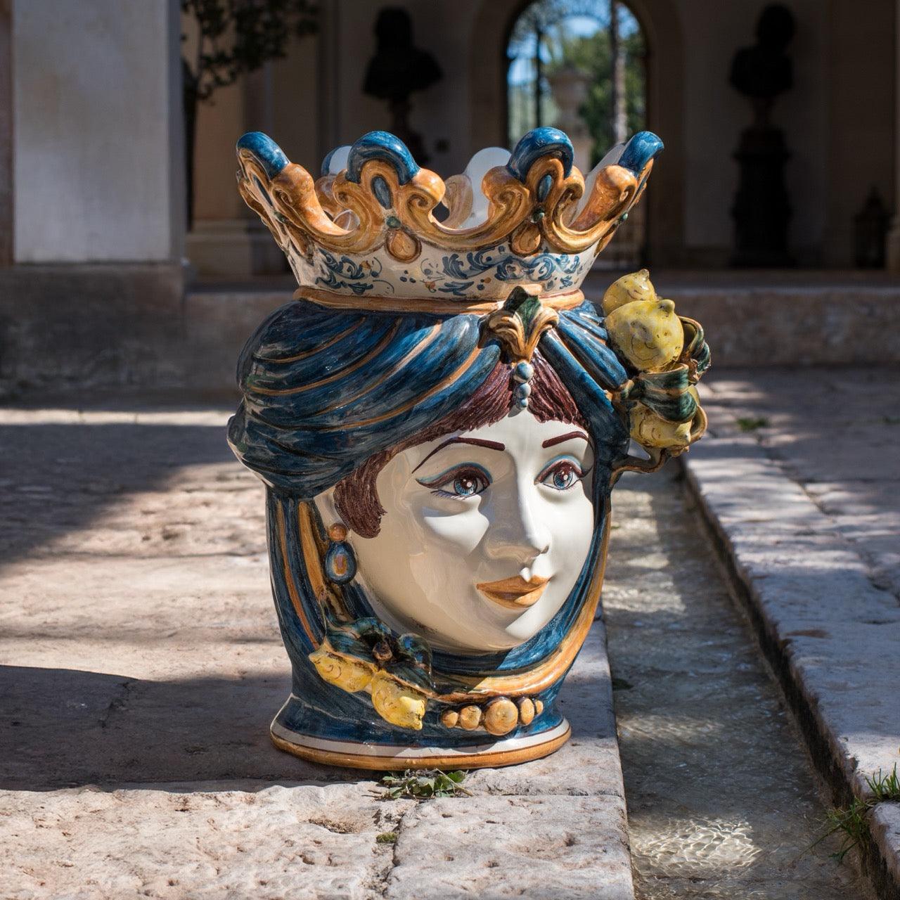 Handcrafted Teste di Moro vase with crown, blue turban, and lemons, blending tradition and modern design.