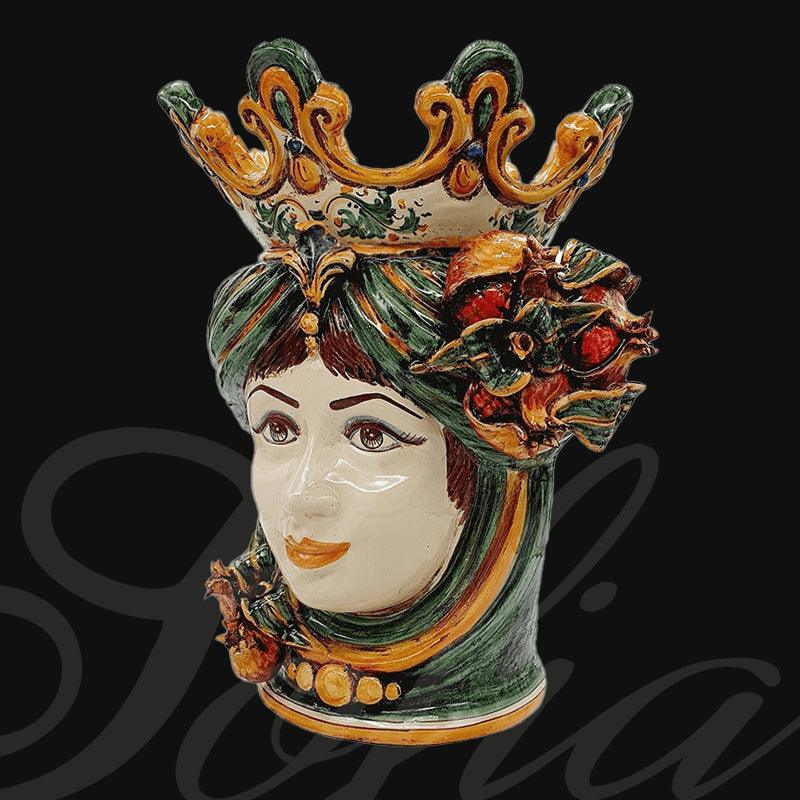 Ceramiche di Caltagirone fatti a mano: testa femminile con corona e fiori, arte tradizionale siciliana